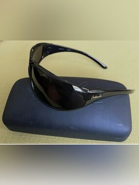 Caribbean Sun CS0048P Polarized Men's Black Wrap Sunglasses & Case
